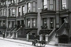 Cornwallis-Terrace-c1911.-with-a-railway-porter-and-a-hand-cart-obviously-delivered-a-large-parcel-to-someone-there